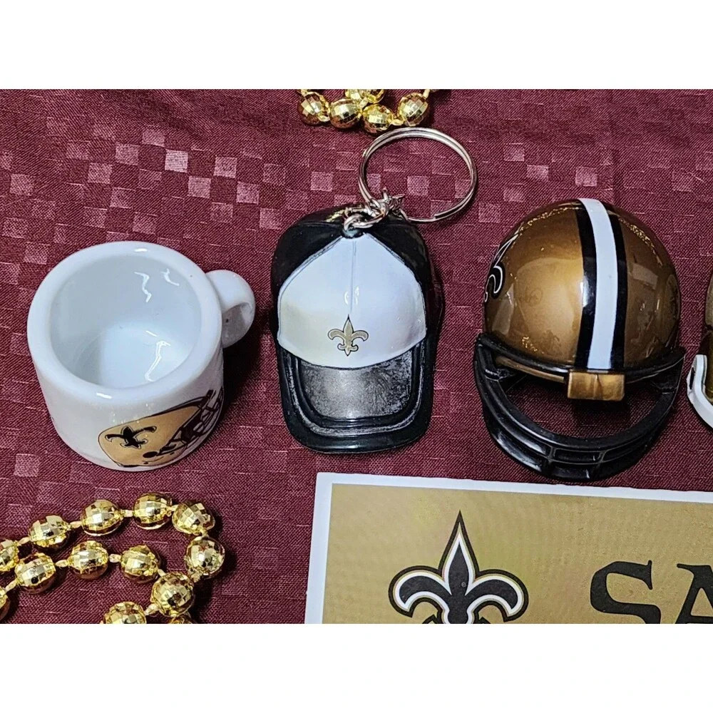 New Orleans Saints Lot Of 16, Stickers, Mini Helmets, Necklaces And Keychain